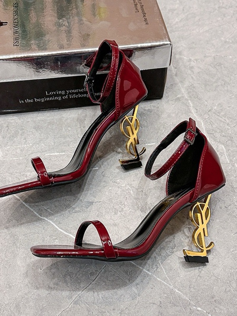 Patent-Look Burgundy Ankle-Strap Heels with Sculptural Gold Heel